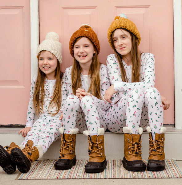 Favorite holiday gift pajamas pjs toddler children boy girl christmas soft cute long sleeves winter girls together sisters sitting Petidoux