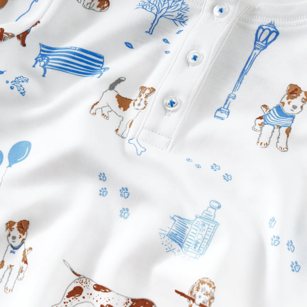 Blue pawprints in the park dogs bench park trees onesie with hat baby close-up Petidoux