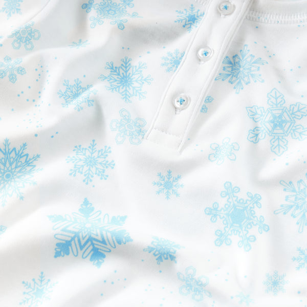 Blue flurries onesie with hat snowflakes baby winter close-up Petidoux