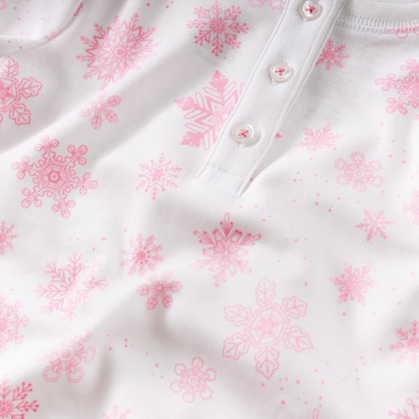 Pink flurries snowflakes pajamas baby onesie hat gift winter holiday Christmas close-up details Petidoux